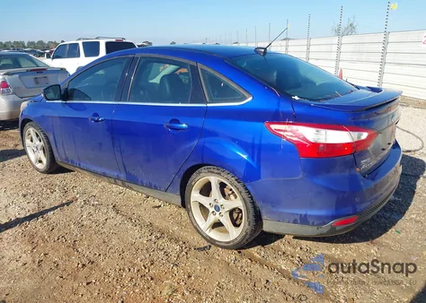 2014 Ford Focus Titanium z USA, uszkodzony, nr VIN 1FADP3J20EL240367